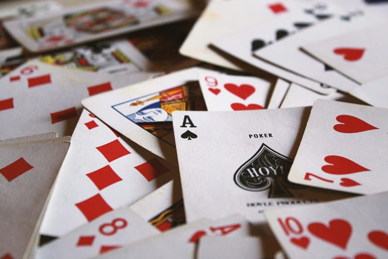 Variety of playing cards on a table